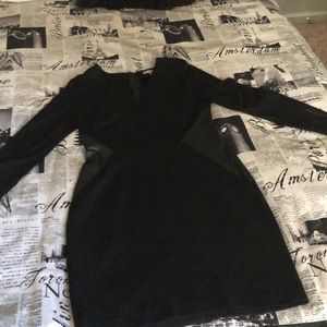 Black V neck dress with leather side inserts